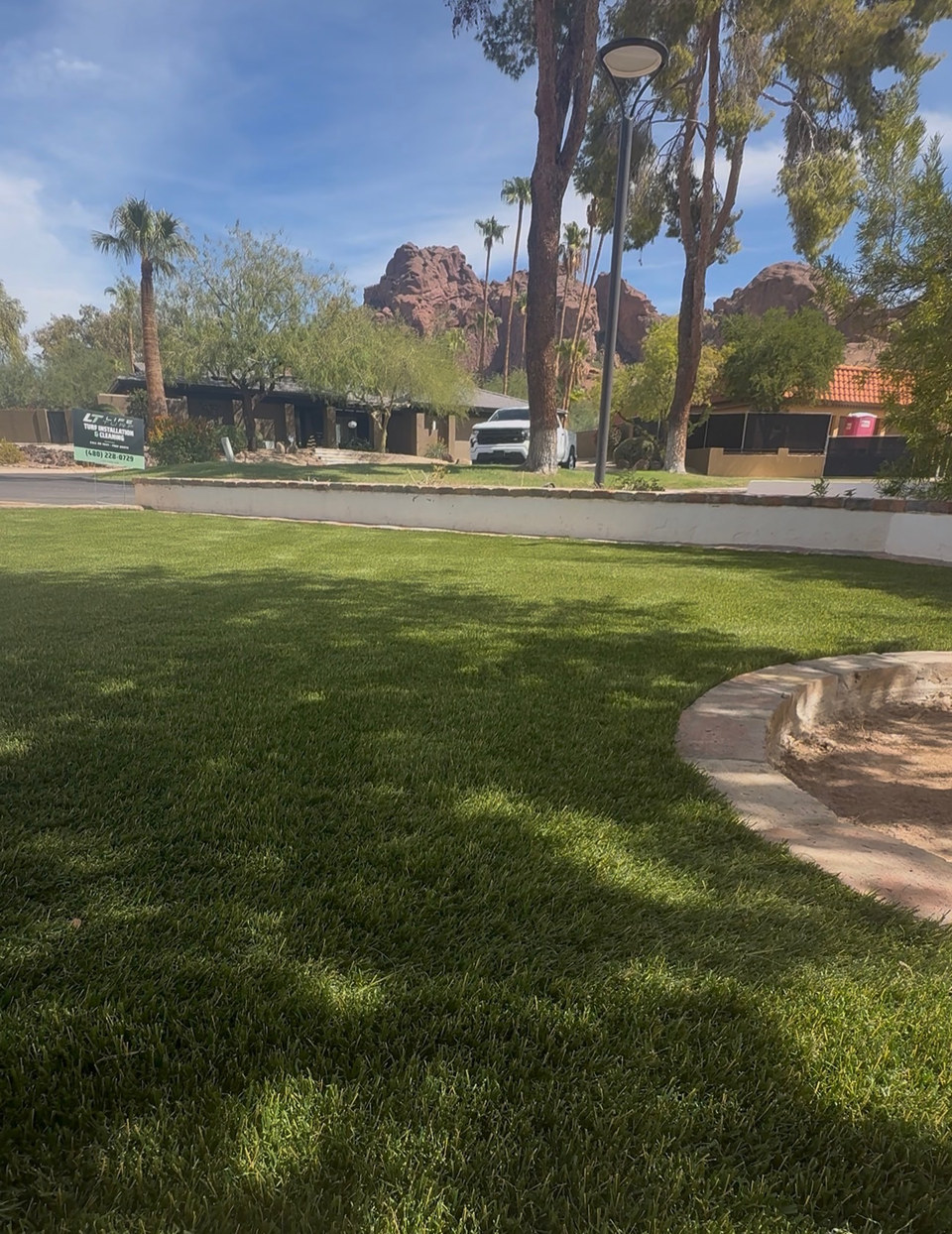 Curved front yard artificial turf lawn installed by Life Turf in Arizona